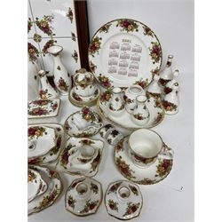 Royal Albert Old Country Roses pattern ceramics, to include table lamp, lidded vase, two pairs of salt and pepper shakers, cups and saucers, plates, biscuit jar, bowls, lidded preserve pot, vases, dishes, knives, napkin rings, lidded jars and box, pair of candlesticks etc