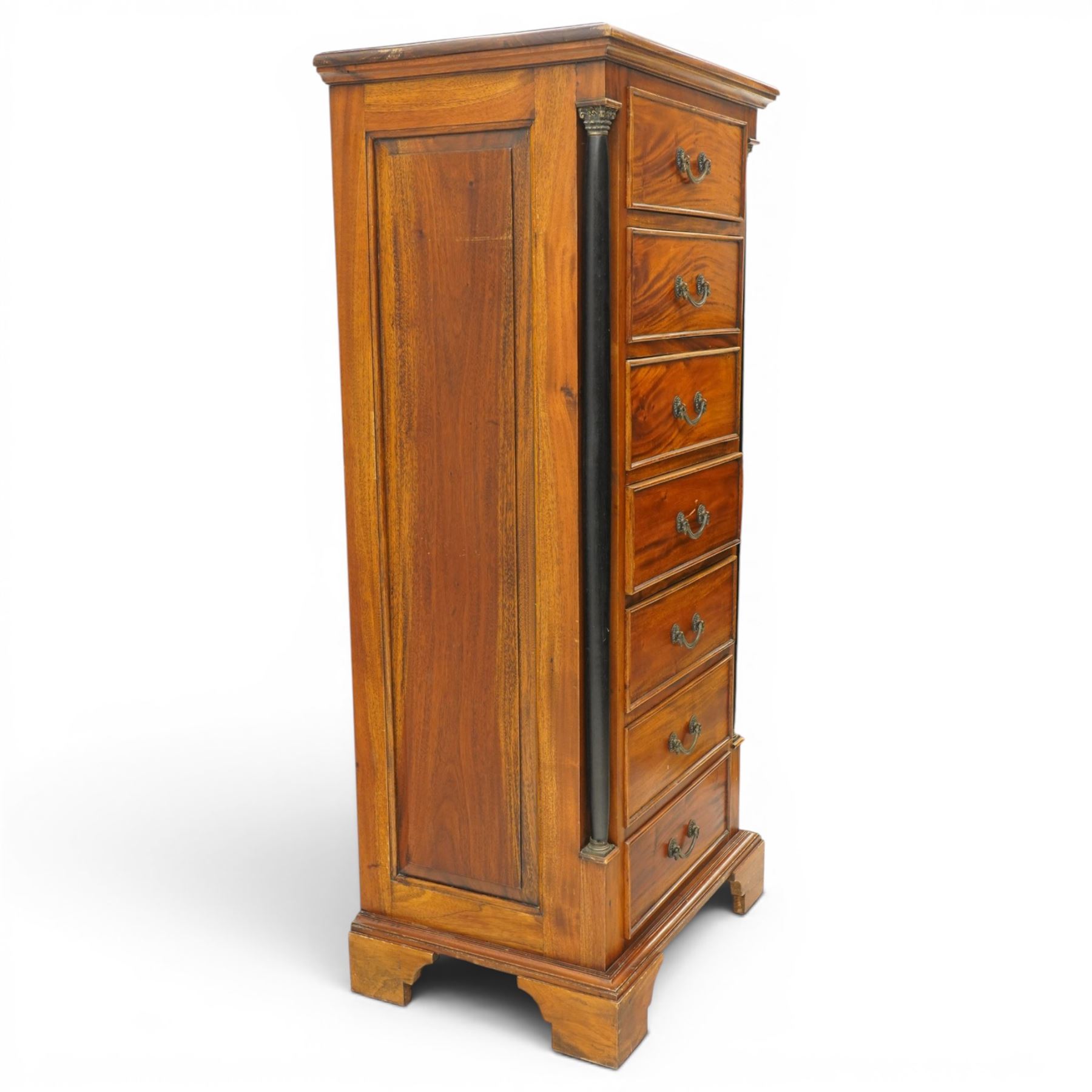 Neoclassical design cherry wood tall pedestal chest, fitted with seven drawers with swan neck handles, flanked by ebonised pilasters with composite capitals, fielded panelled sides on bracket feet