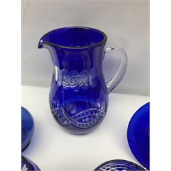 Bristol blue glass jug, together with blue claret jug, saucer, blue cut water jug, and seven matching glasses, water jug H22cm