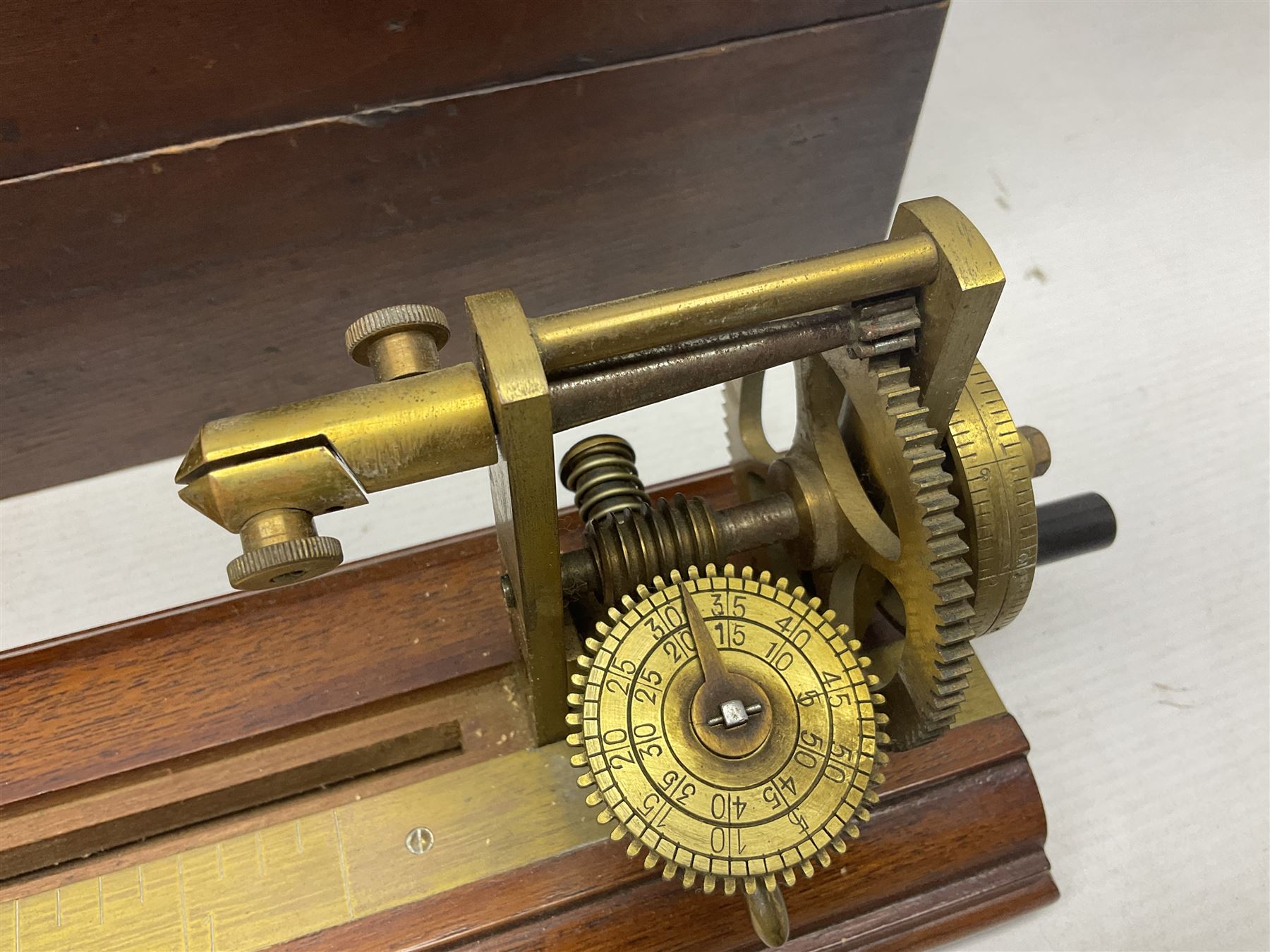 Early 20th century worsted spinners walnut and brass twist tester by J.H. Heal Maker Halifax L61cm; in original box with paperwork