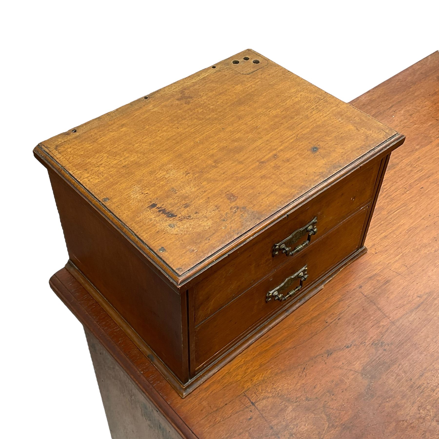 C. Hindley & Sons (London: 1820-1892) - Late Victorian walnut twin pedestal desk, the rectangular moulded top surmounted by two banks of two drawers over eleven graduating drawers, on moulded plinth base, the central drawer stamped 'C. Hindley & Sons, 134 Oxford Street, London, 5298'