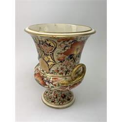 Early 19th century Derby campagna vase, with twin gilt serpent modelled handles and raised upon a spreading circular foot, decorated in the Imari pattern, with painted mark beneath, H21cm