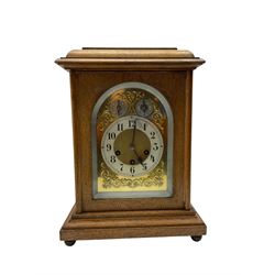 Jungans-German Edwardian 8-day oak cased mantle clock, with a stepped flat top and glazed ...