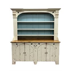 Rustic cream painted dresser, fitted with four arch top cupboards and three tier plate rack