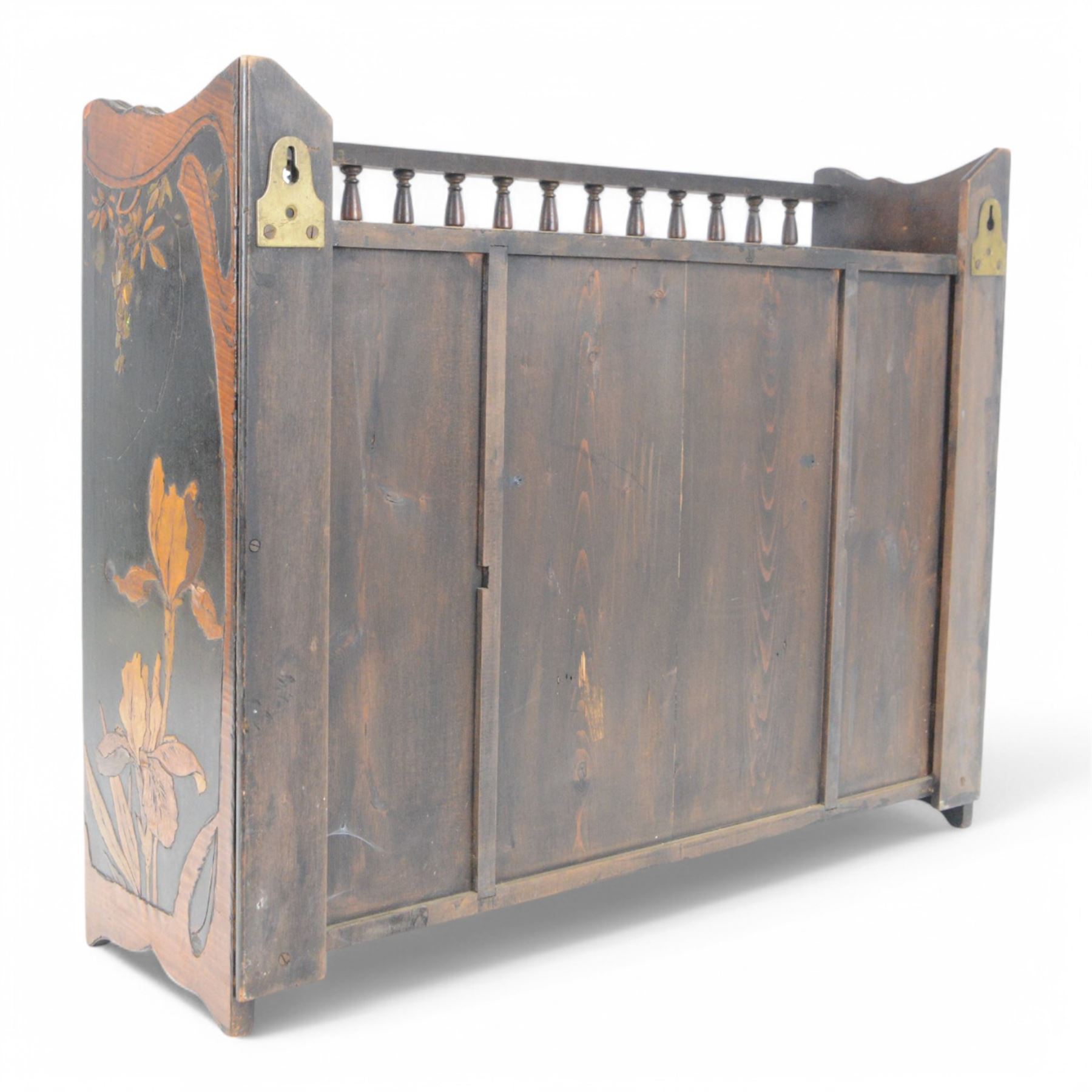 Japanese wall cabinet, the central hinged panel depicting a warrior opening to reveal single drawer, with two shelves to either side decorated throughout with floral and foliate decoration, H47cm