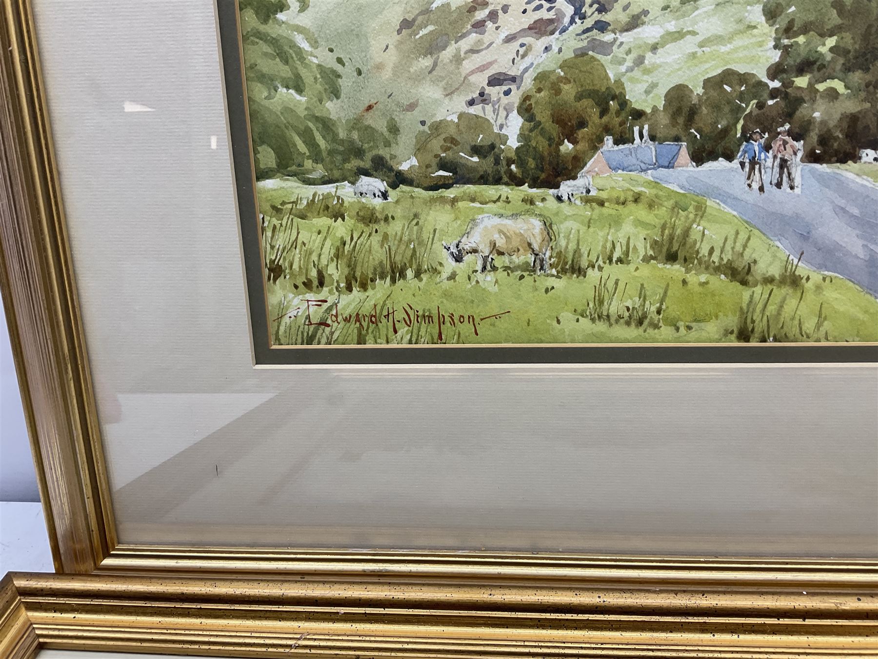 Edward H Simpson (British 1901-1989): Folkton Village Main Street and Hiking through the North Yorkshire Moors, two watercolours signed max 36cm x 52cm (2)