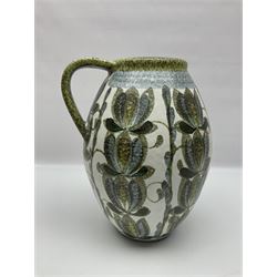 Large Denby jug, with mottled blue and green foliate decoration on a white ground, by Glynn Colledge, signed beneath, H30cm