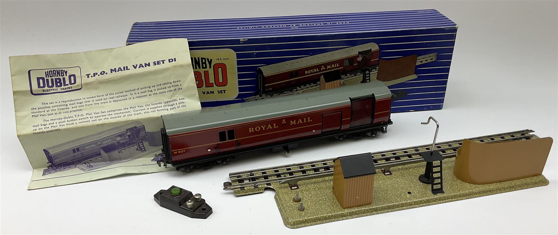 Hornby Dublo - Breakdown Crane No.4062 with Cowans Sheldon livery, boxed with screw jacks; D1 Girder Bridge, boxed; and T.P.O. Mail Van Set, boxed with instructions, mail bags, switch and tested tag (3)