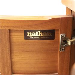 Nathan - concave corner cabinet, each of quarter round form with square top to fit against a wall, with open display compartment above a signature square panelled cupboard door, raised on a recessed plinth base