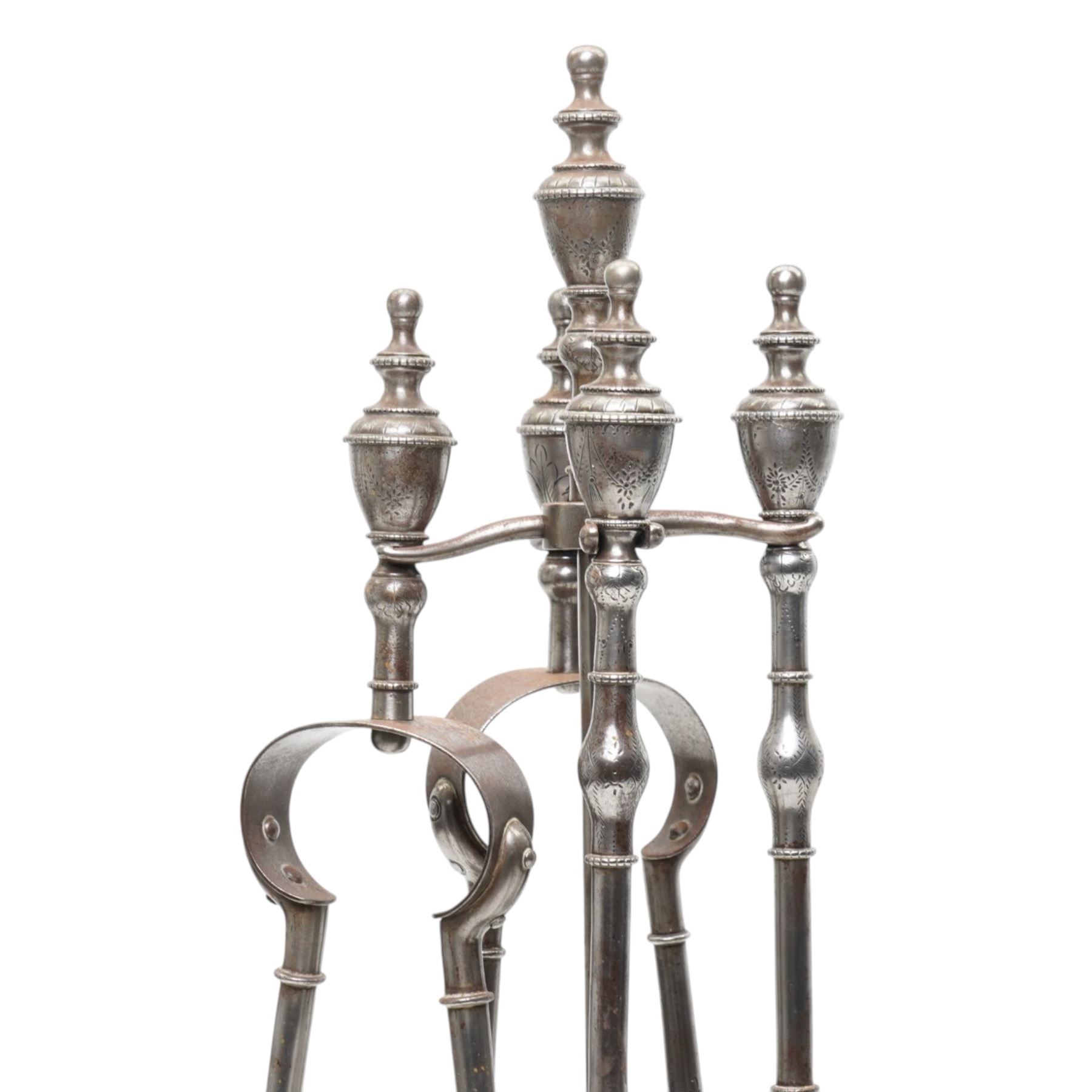 Two 19th century fireside companion sets, one four piece and one three piece, the stand and irons with etched foliate motifs, larger H74cm (2)
Provenance: Kirkham Hall