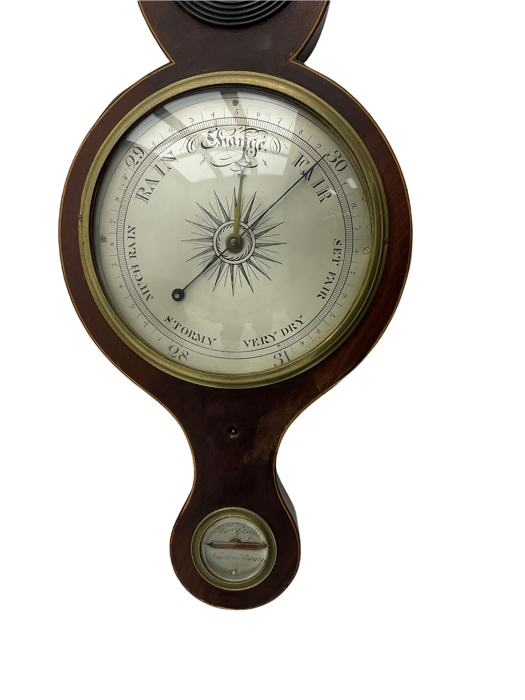 A mid Victorian mercury wheel barometer retailed by Thomas Grey of Newton Stewart, in a mahogany case with inlay to the edge, swans neck pediment and rounded base, with an 8” silvered register recording barometric air pressure from 28 to 31 inches with weather predictions, brass recording hand and steel indicating hand within a convex glass and cast brass bezel, silvered “butlers” mirror with reeded wooden surround and a round topped thermometer box with a mercury thermometer measuring degrees Fahrenheit, level bubble with silvered nameplate. H96cm
.

