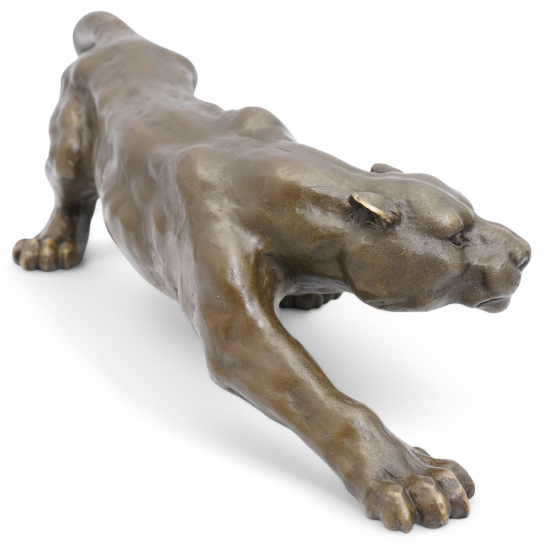 Bronze figure, modelled as a cougar or panther in crouching pose, signed Milo and also bearing foundry mark, L40cm