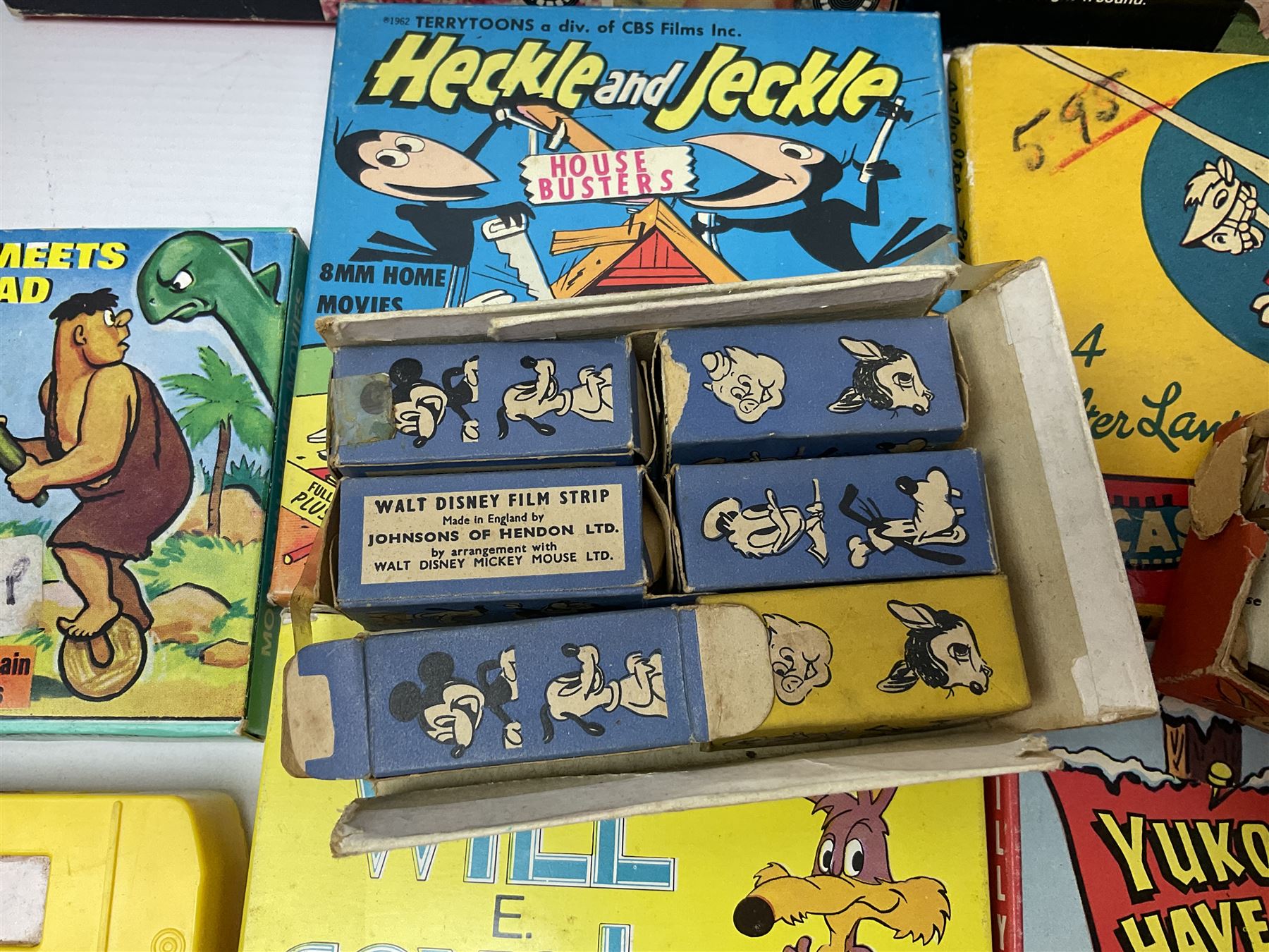 Corgi/Disney - Movie Vision, in original box, with Corgi projector, two Corgi Movie Viewers and nine films; together with 8mm film reels and strips to include Disney’s Dumbo, Mickey Mouse, Alice in Wonderland etc, most in original boxes