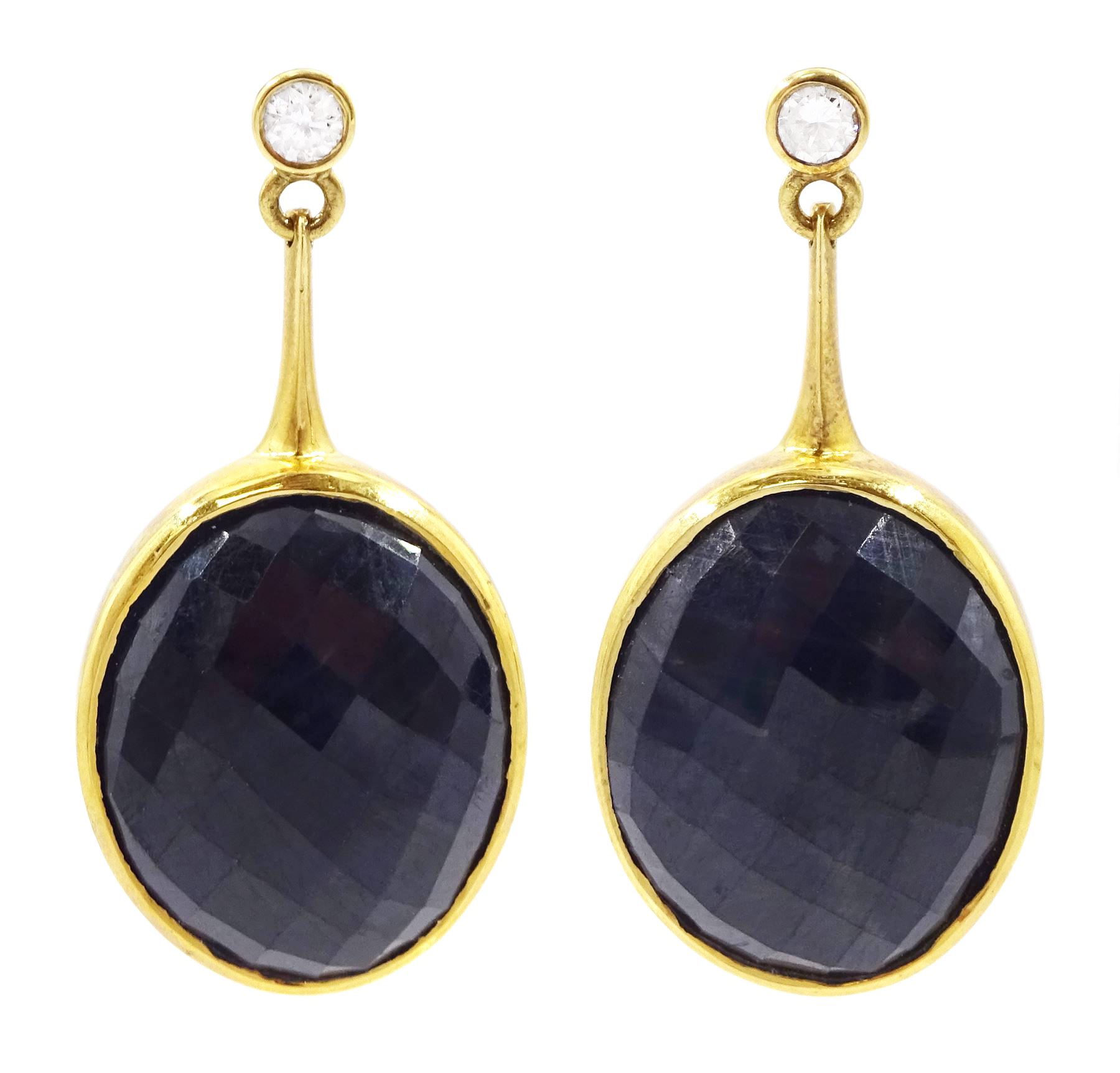 Pair of 18ct gold sapphire and diamond pendant earrings, each stud set with a single briolette oval cut sapphire, suspending from a single round brilliant cut diamond, hallmarked, total sapphire weight approx 40.00 carat, total diamond weight approx 0.20 carat