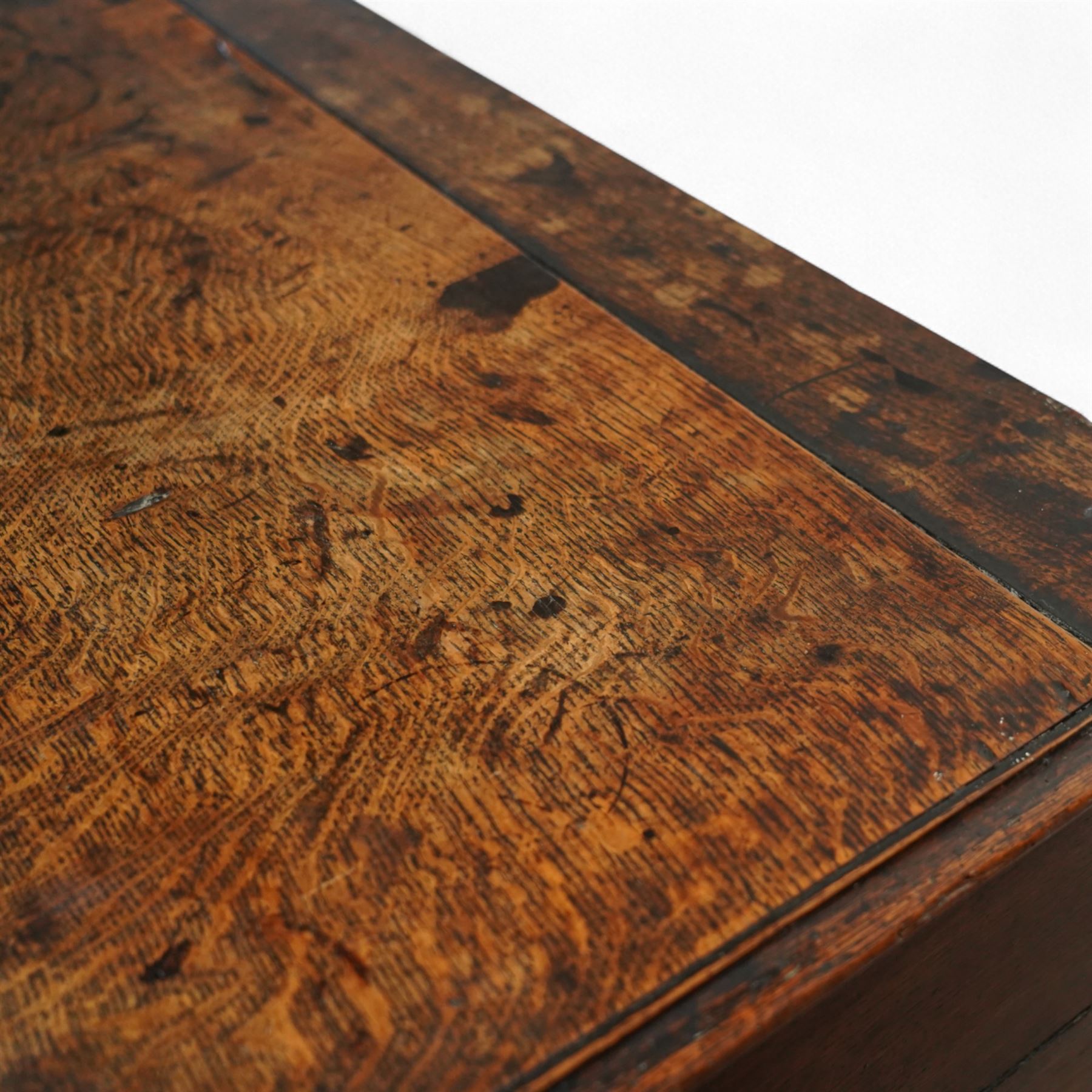George III oak dresser base, fitted with three drawers with brass swan-neck handles, shaped apron and cabriole legs on pad feet 