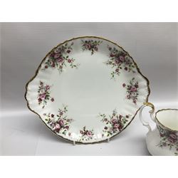 Royal Albert Cottage Garden pattern tea service for six people, comprising teapot, milk jug, sugar bowl, teacups and saucers, side plates and cake plate, all with printed mark beneath