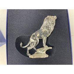 Swarovski Crystal 'Lion Standing on a Rock' figure from the 'Rare Encounters' collection, no.269337, with fitted box and carboard sleeve