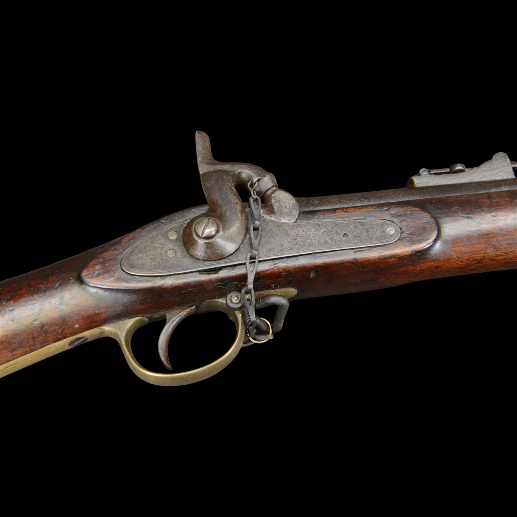 19th century Enfield percussion rifle, the 99cm barrel with three barrel bands, fore sight and rear sight, ramrod under, full walnut stock with brass butt, carrying sling brackets, action marked '1855 Tower' with Victoria cypher, overall L138cm
