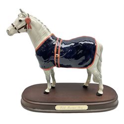 Beswick figure, grey Welsh Mountain Pony in a blue rug on plinth, no A247 H23cm