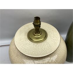 Large cream crackle glaze table lamp, together with a tall studio pottery vase in green with single loop handle, with impressed makers mark, H49cm