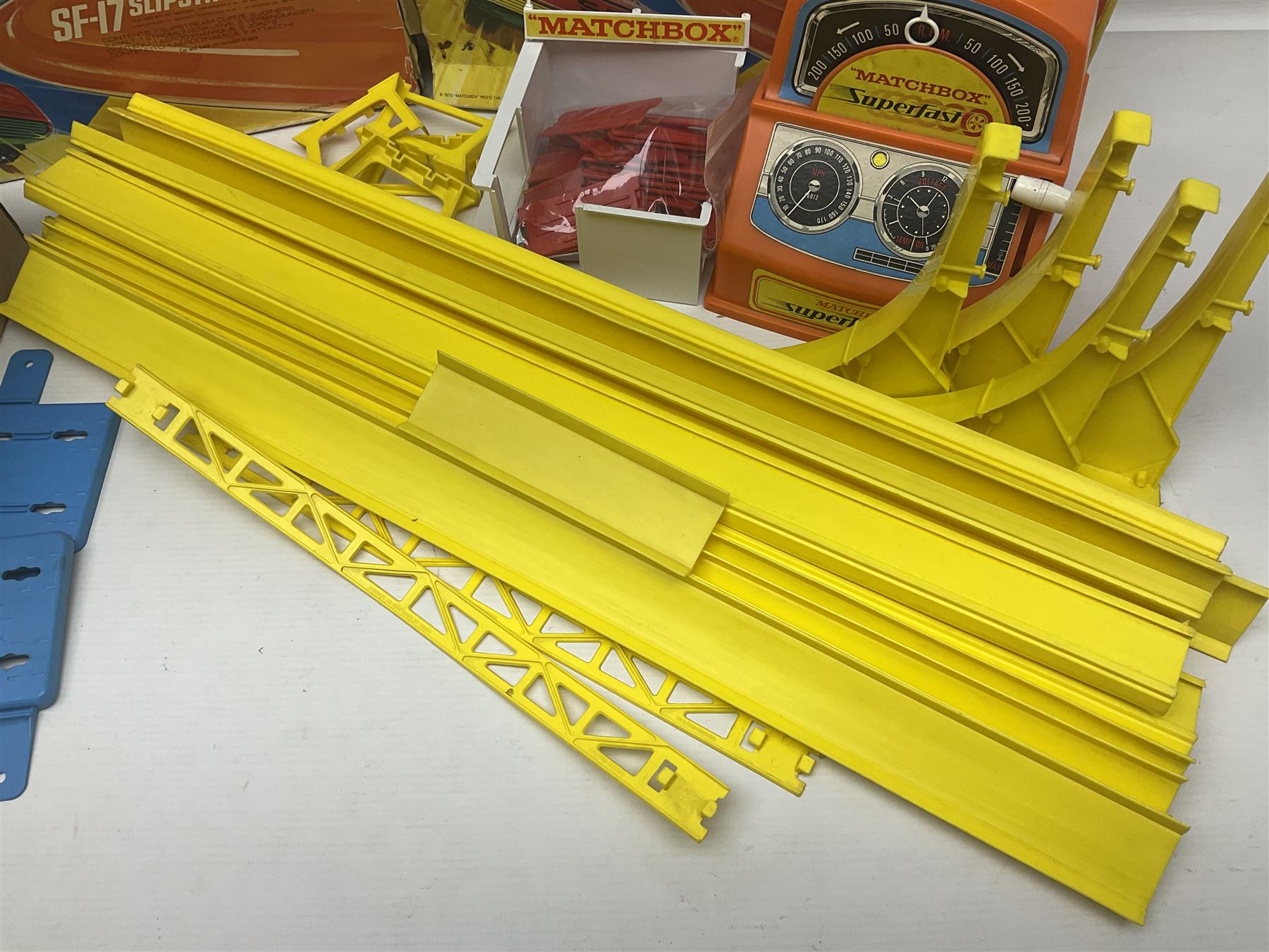 Matchbox Superfast track racing Set with Superbooster and two boxed SF-17 Slipstream Curves; together with five boxed Superfast models - 3d Monteverdi Hai, two 7d Hairy Hustler, 45c Ford Group 6 and 66d Mazda RX500; and quantity of unboxed and playworn other die-cast models