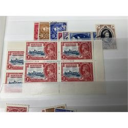 King George V Silver Jubilee stamps 1910-1935 including Bermuda marginal mint block of four, Virgin Islands marginal mint blocks of four including variations/errors, other similar blocks of four etc, various Royal Silver Wedding 1948 stamps, King George VI Victory 8th June 1946, Queen Elizabeth II Coronation etc, housed in a stockbook