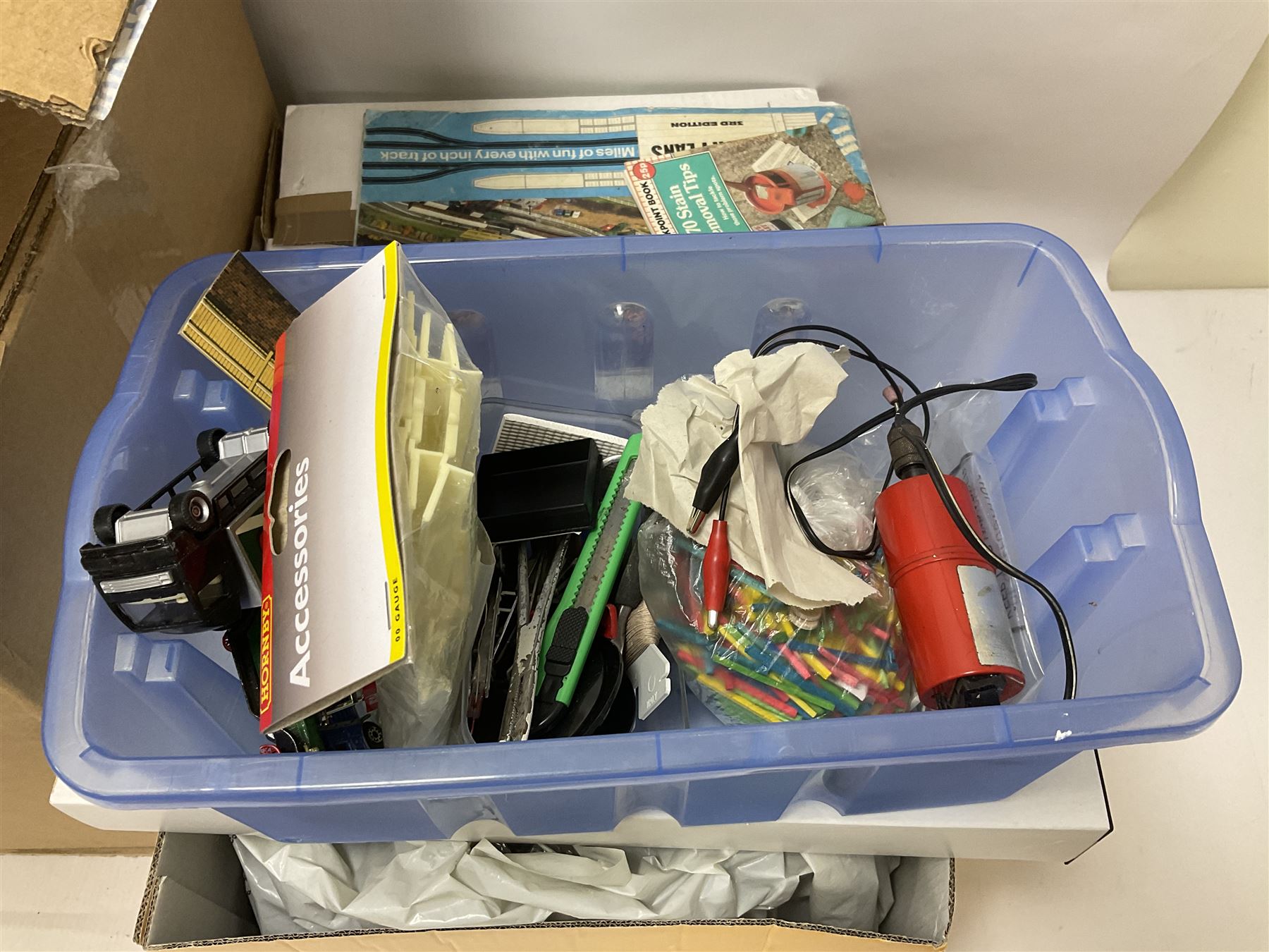 Extensive collection of scratch built buildings for use on ‘00’ gauge model railway layout, small amount of accessories and tools with a quantity of railway magazines and leaflets, in three boxes 