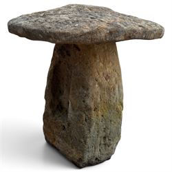 Pair of 19th century weathered hewn sandstone two-piece staddle stones, domed circular top over a tapering base