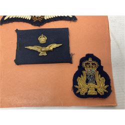 Quantity of WW1 and later Royal Navy and RAF cloth and metal badges and insignia