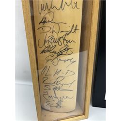 Two signed Yorkshire County cricket bats, bearing signatures including Anthony McGrath, Jacques Rudolph, Michael Vaughn and Matthew Hoggard, etc, both within glazed presentation boxes, box H86.5cm, together with a framed Darren Gough signed presentation print by Gary Keane