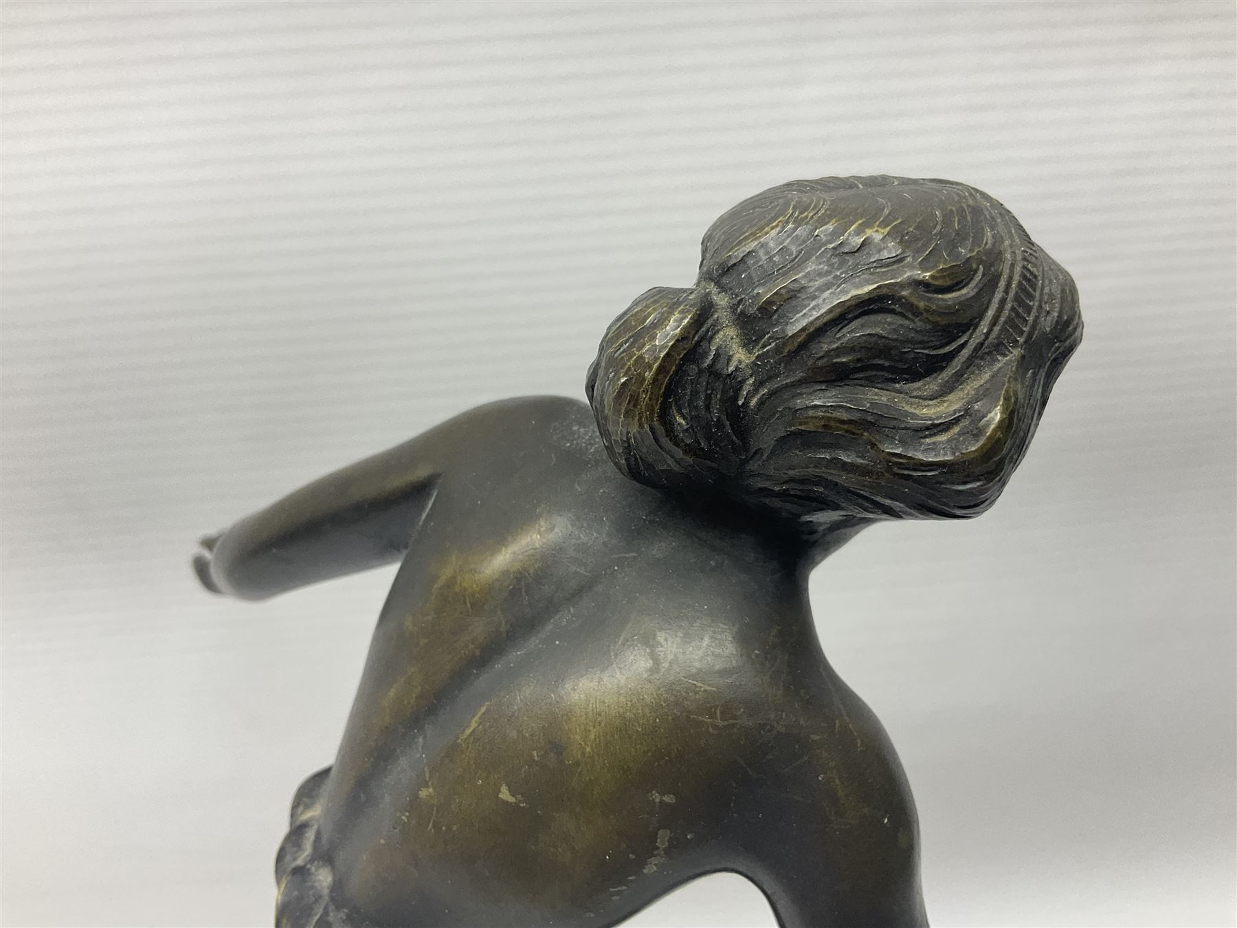 After C. Rochlitz, bronze, modelled as a semi nude female figure, upon a marble plinth, overall H31cm