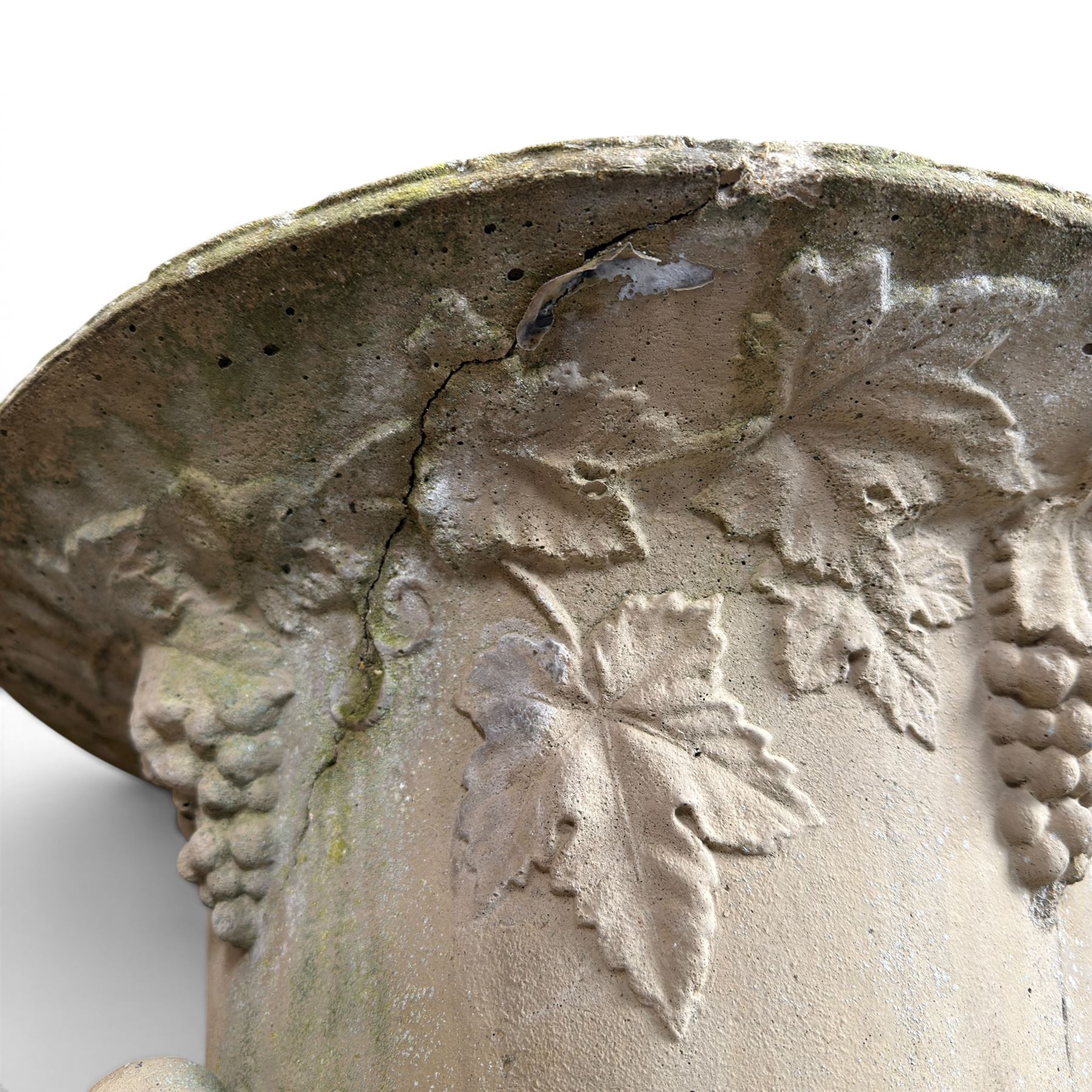 Cast stone classic garden urn, the rim decorated with leaves and berries, twin handles with face masks, raised on square base, stamped HGC