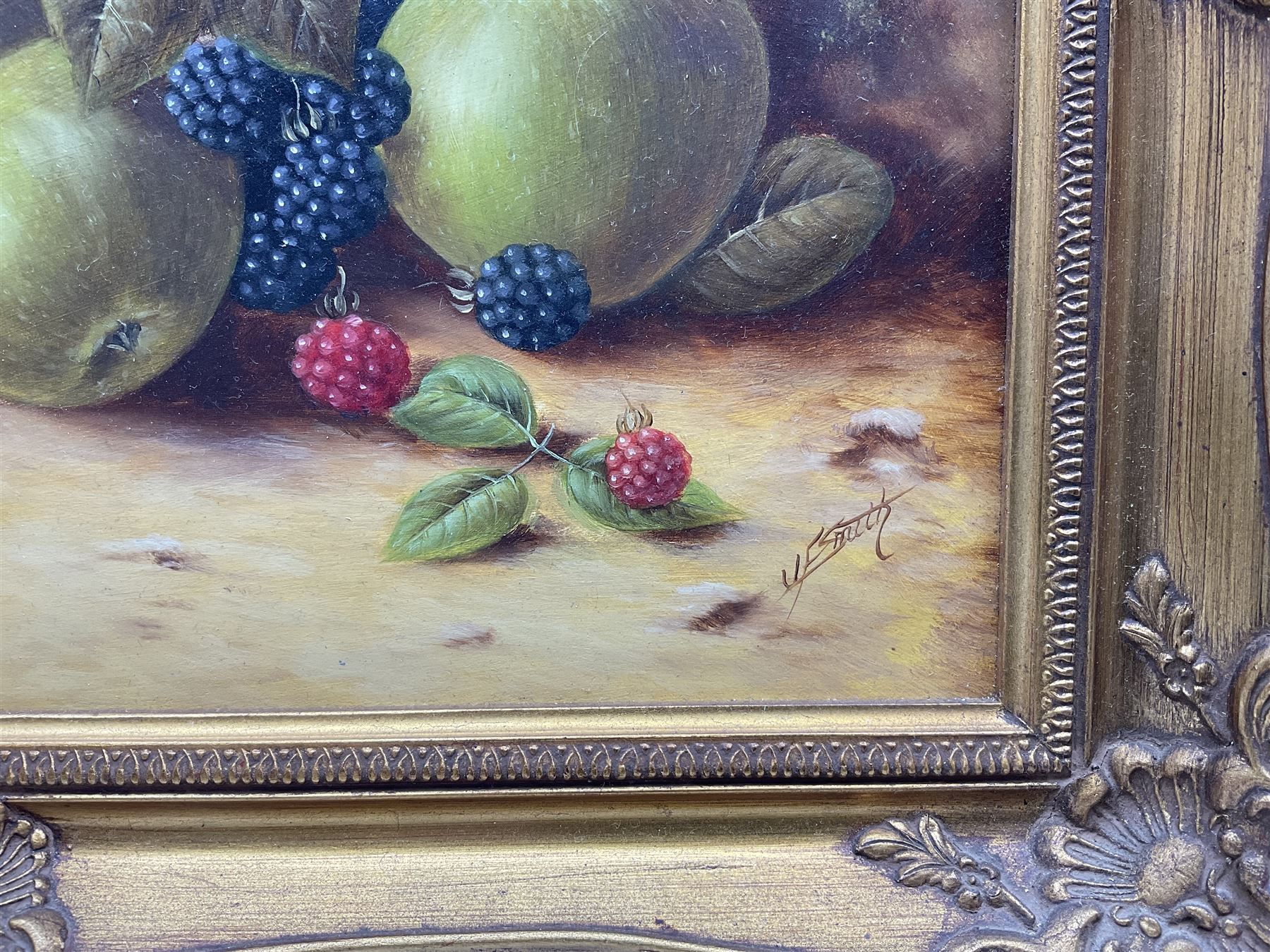 John F Smith (British 1934-): Still Life of Fruit, oil on board signed 30cm x 40cm 
Notes: Smith was employed by Royal Worcester as a fruit painter between 1950 and 1971.