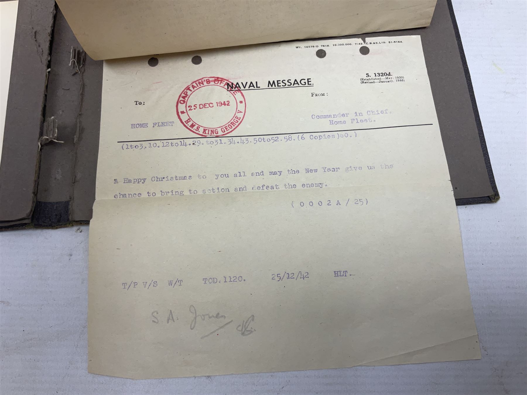 Disbound WW2 album relating to the battleship HMS King George VI containing over fifty various size loose photographs of the ship in action, guns firing, crew members, aircraft, two of George VI on board, three of Winston Churchill on board, official 1942 Christmas messages including Franklin Roosevelt etc; together with unrelated printed letter on 10 Downing Street notepaper from Winston Churchill; and Order of Service for Churchill's funeral at St. Paul's Cathedral 30th January 1965