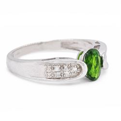 9ct white gold tsavorite garnet and diamond ring, single oval cut garnet with pave set diamond shoulders, Birmingham 2008