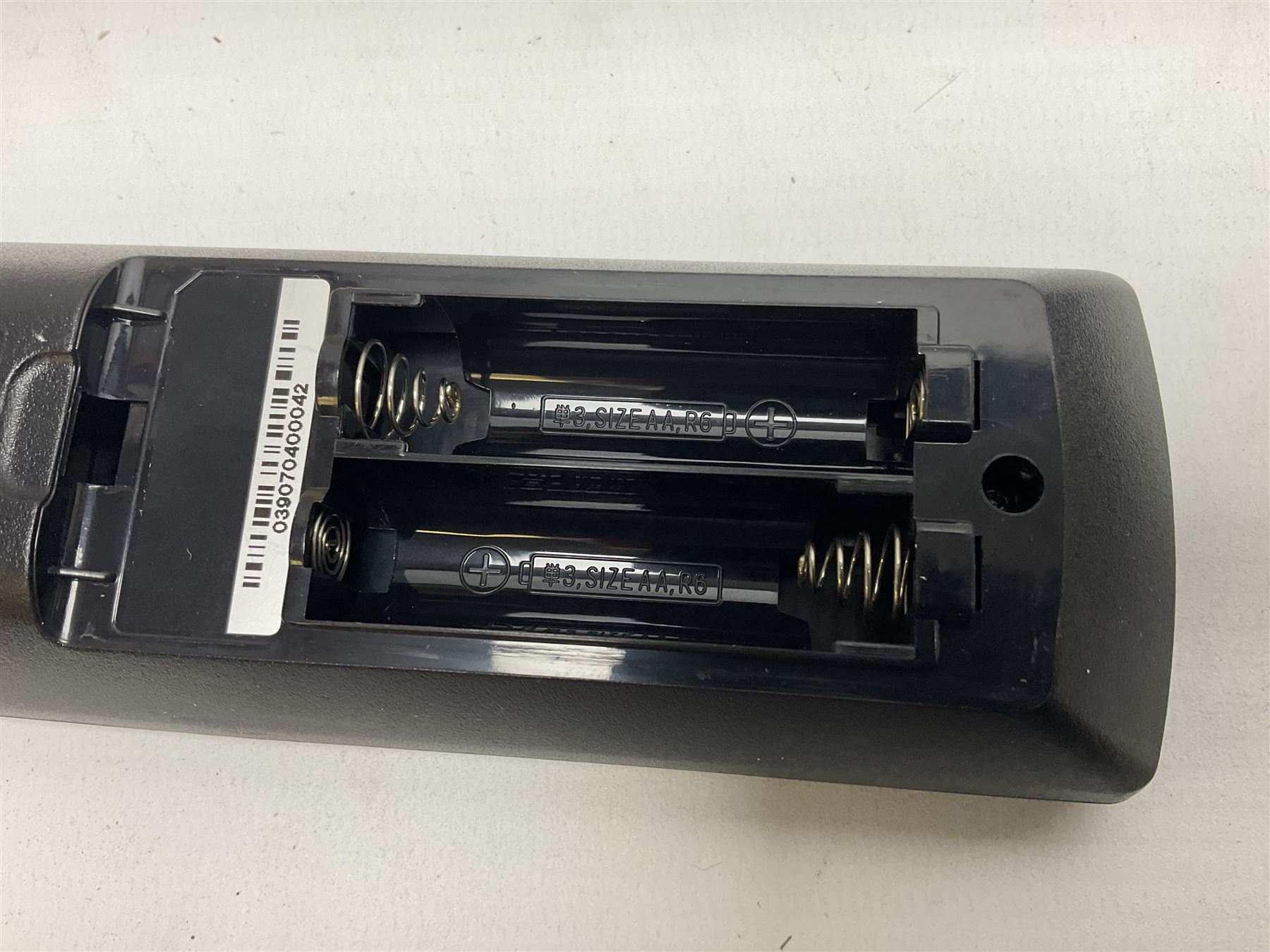 Sony PlayStation 3 60GB console with one PS3 controller, two PS2 controllers, BD remote control, PSP handheld gaming console with case, GAMEware PSP essentials pack, and a selection of PS2, PS3 and PSP games in original cases with instruction booklets 