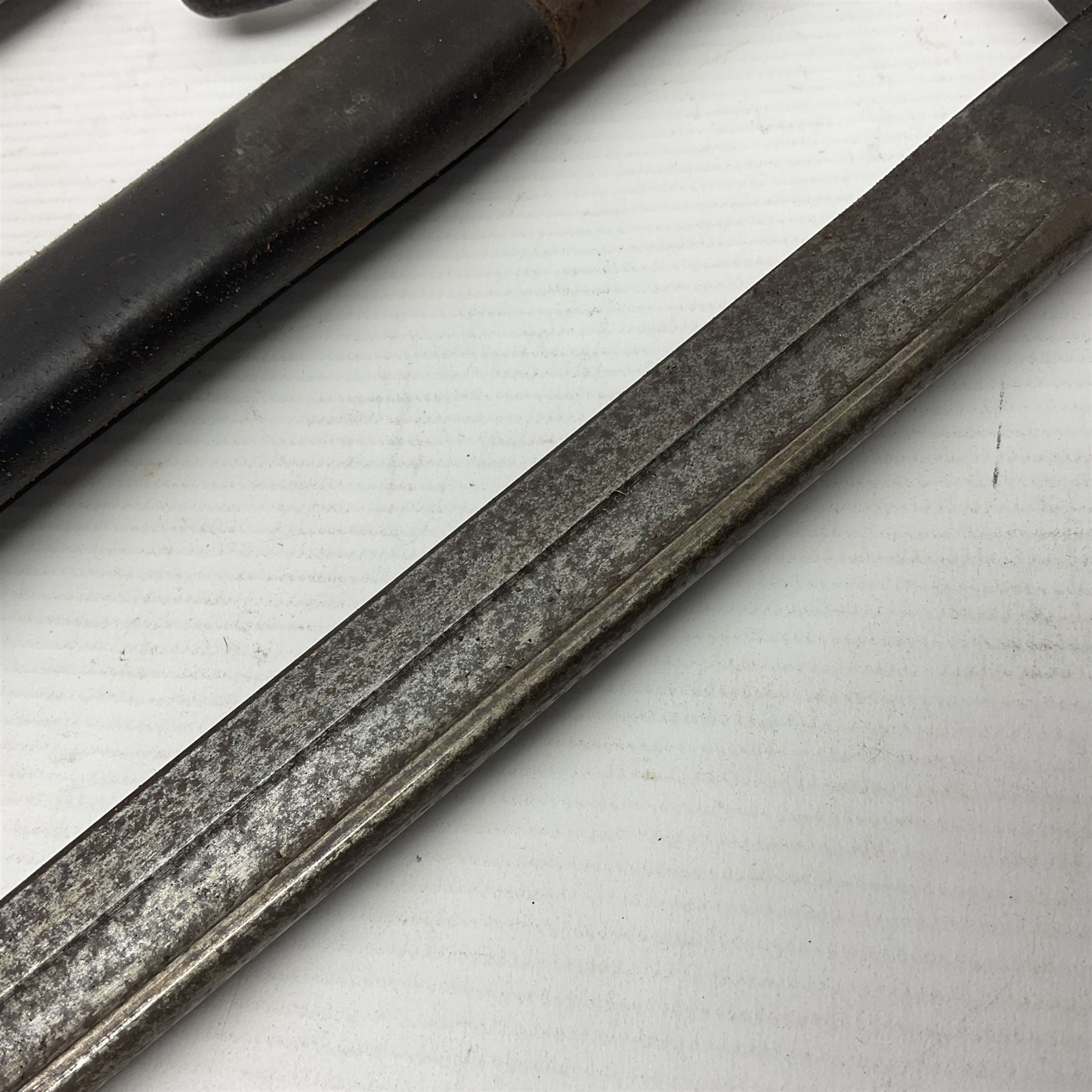 WWI Remington Pattern 1913 bayonet, the 43cm fullered blade with various marks to the ricasso including date code 11 16; in leather covered scabbard with various stamps including JWB 17 L58cm overall; and a French Model 1866 sabre bayonet (no scabbard)