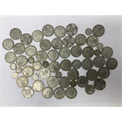 Approximately 500 grams of Great British pre 1947 silver coins, including  florins, one shillings and threepence pieces