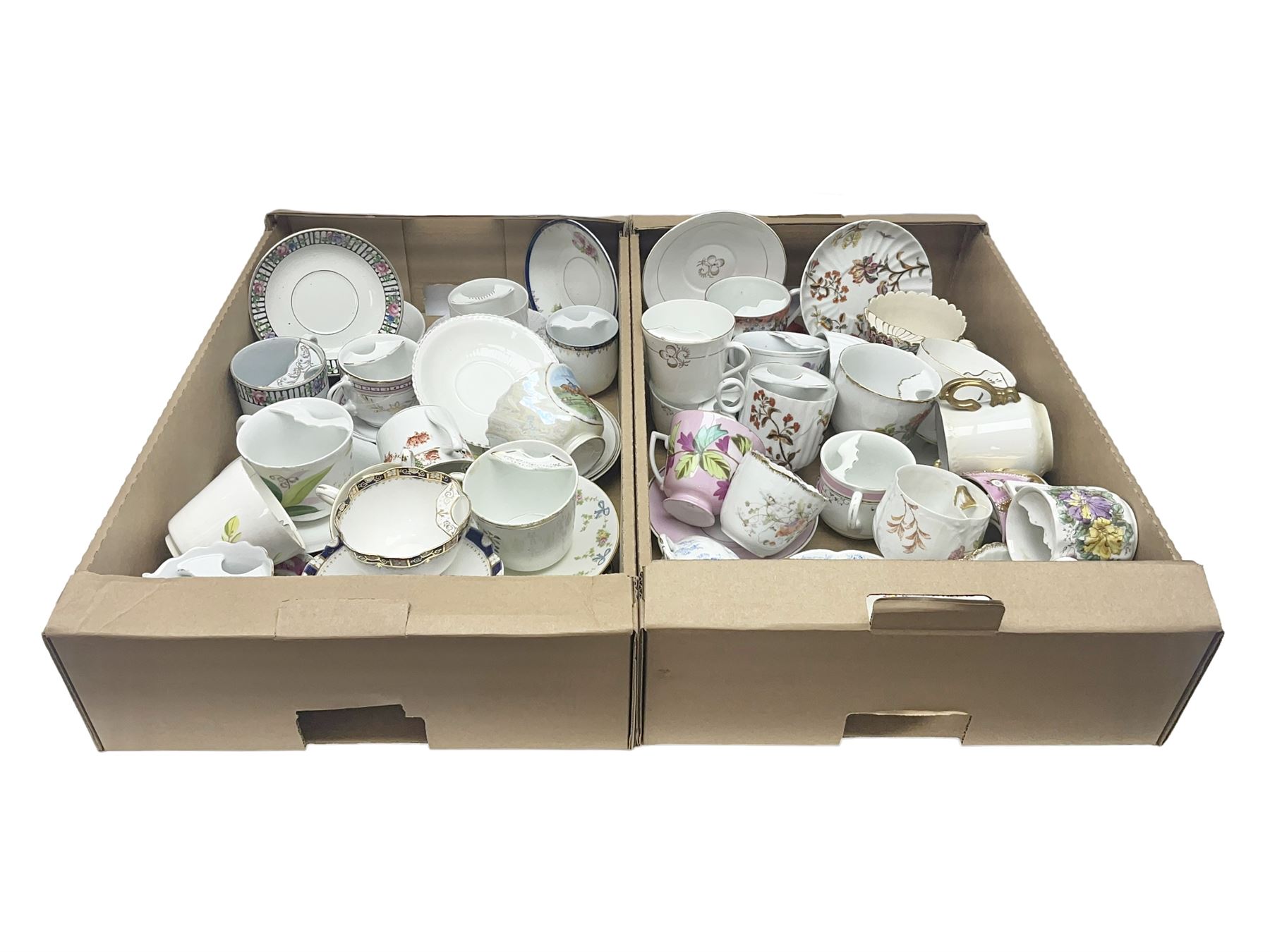 Collection of 19th century and later moustache cups, mostly with matching saucers, including hand painted examples