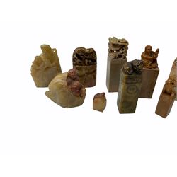 Group of Chinese hardstone and soapstone seals and figures, to include examples with terminals modelled as dogs of foo, dragons, phoenix, koi, flying horses of Gansu, etc. (16).  