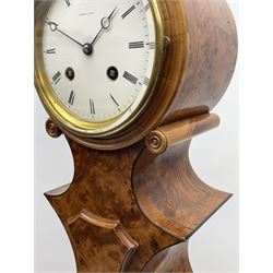 Miniature longcase clock in yew wood case, circular Roman dial signed ‘Howell & James Paris’ enclosed by bevelled glass bezel and surround by mould and roundels, shaped and waisted trunk on rectangular base with top mould, on ogee bracket feet, twin train movement striking the hours and half on bell, the movement stamped ‘Howell & James Paris’ and numbered ‘13092’ 