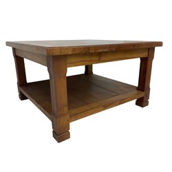 Acorn Industries - yew two-tier coffee table, square top, raised on chamfered supports, carved acorn signature to foot, by Alan Grainger of Brandsby