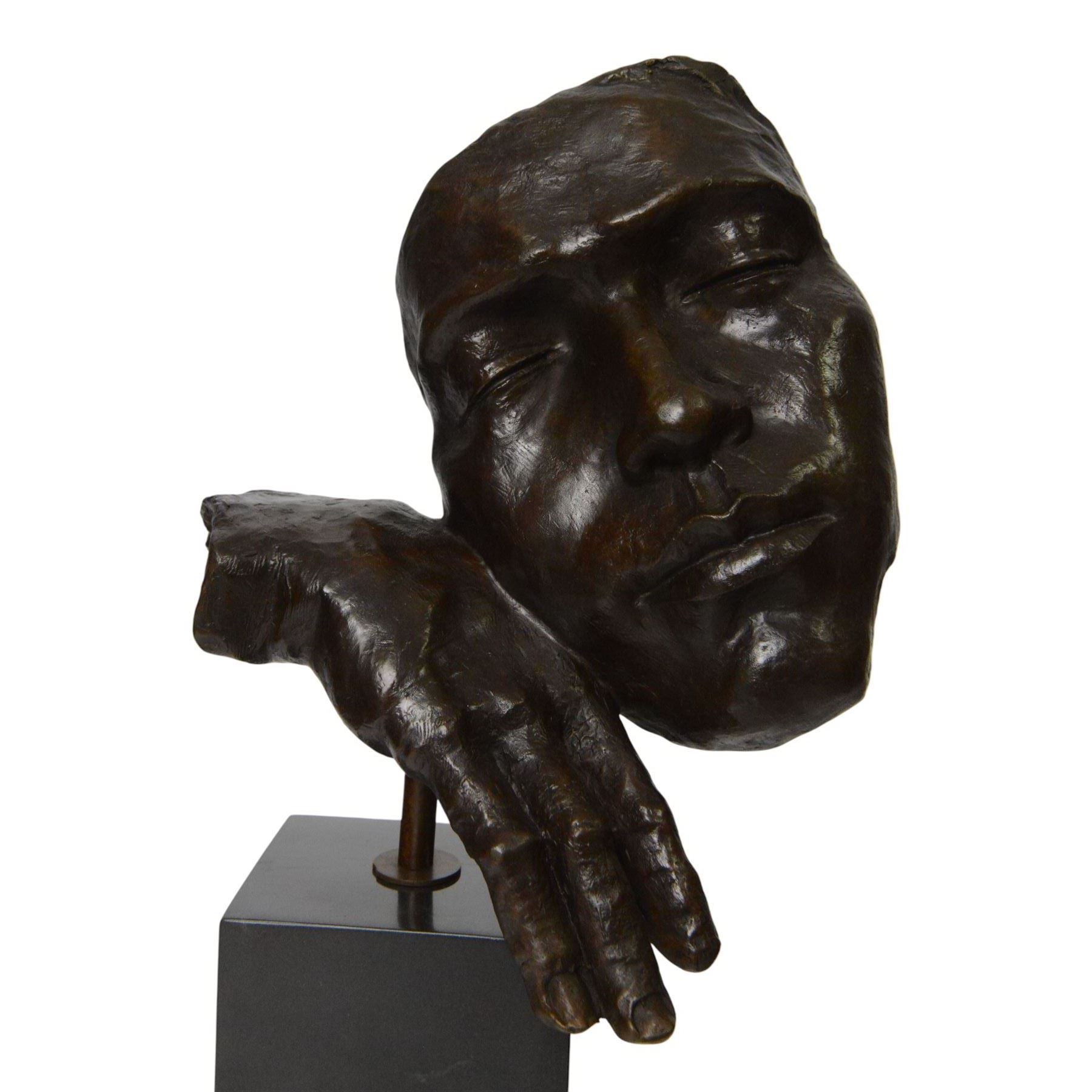After Salvador Dali (Spanish 1904-1989): Dreams, bronze figure with head resting on hand H39cm