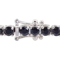18ct white gold sapphire line bracelet, stamped 750, total sapphire weight approx 7.40 carat