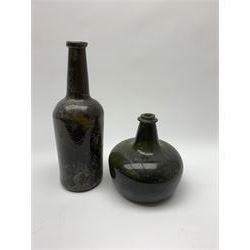 18th century green glass bottle, of onion form, H15cm, together with an 18th century green glass wine bottle, with seal depicting a boar beneath a crown, probably the Edgcumbe Crest, H27cm