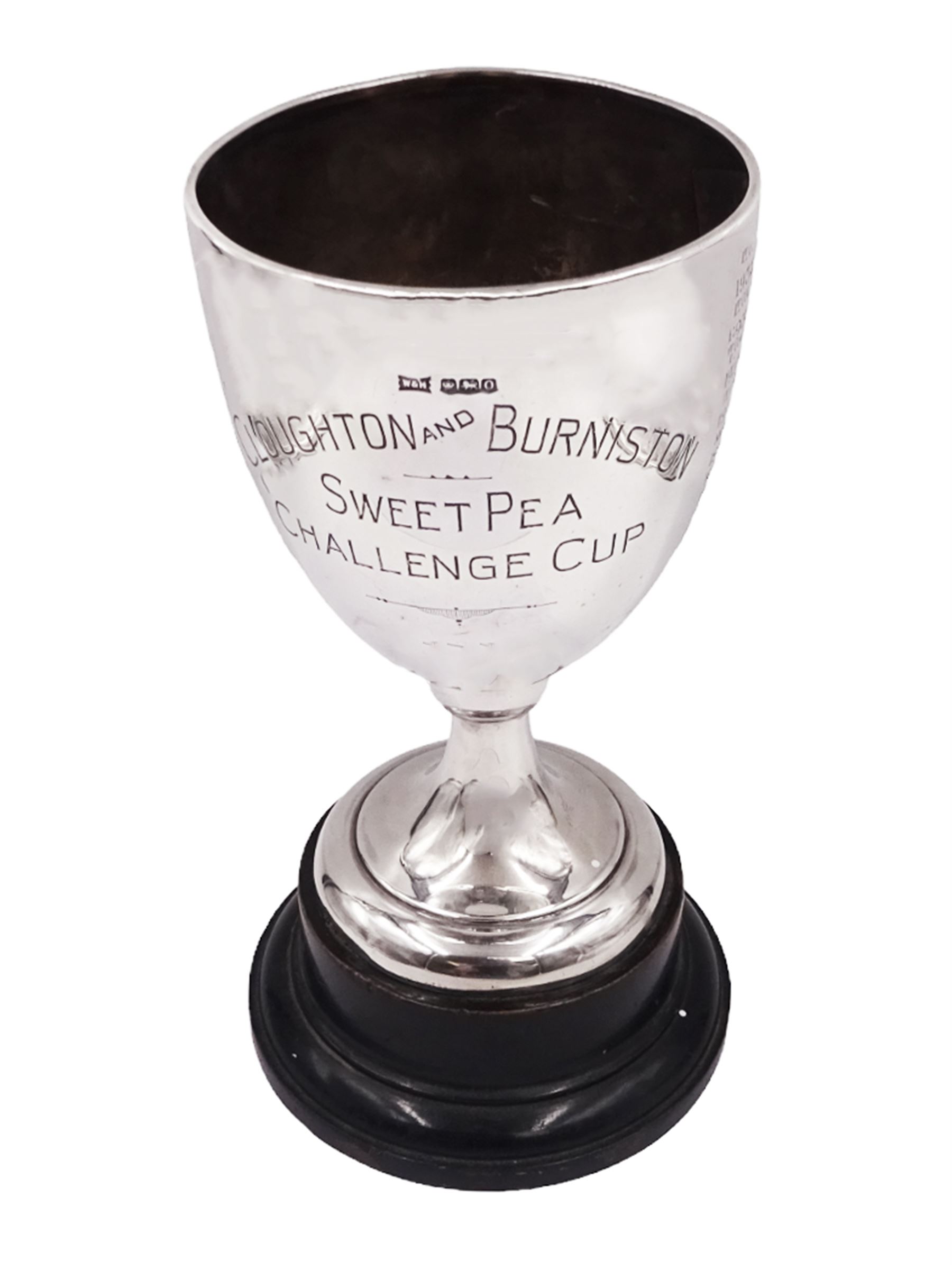 1930s silver trophy cup, of plain form, upon knopped stem and circular stepped foot, body with presentation engraving 'Cloughton and Burniston Sweet Pea Challenge Cup' with winners engraved verso, hallmarked Walker & Hall, Sheffield 1931, upon ebonised base, including base H28.7cm
