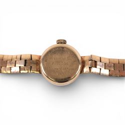 Buren ladies 9ct gold manual wind presentation wristwatch, on integral 9ct gold bracelet strap, hallmarked