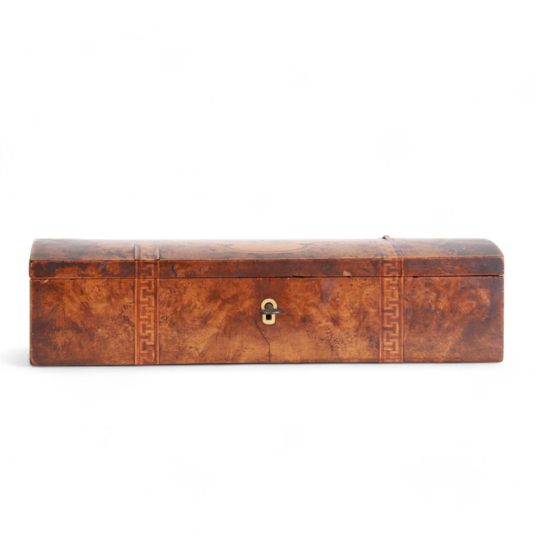 Late 19th century marquetry and parquetry glove box by Anton Seuffert, Auckland, New Zealand, the burr veneer (possibly totara) box of rectangular form, the hinged domed cover detailed with a central shaped cartouche containing a fern, flanked by two cube bands, the interior with paper label detailed 'A. Seuffert Cabinet Maker to His Royal Highness the Duke of Edinburgh Elliot St. Auckland New Zealand', H7.5cm L29cm D10cm, with accompanying key believed to be original 
This item has been registered for sale under Section 10 of the APHA Ivory Act