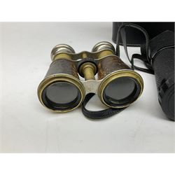 Four pairs of binoculars comprising Carton 10x50, G.F.Smith & Son Ltd 8x30 housed in a leather case, Zenith 10x50 cased and a pair of antique binoculars marked ‘8 Lenses’