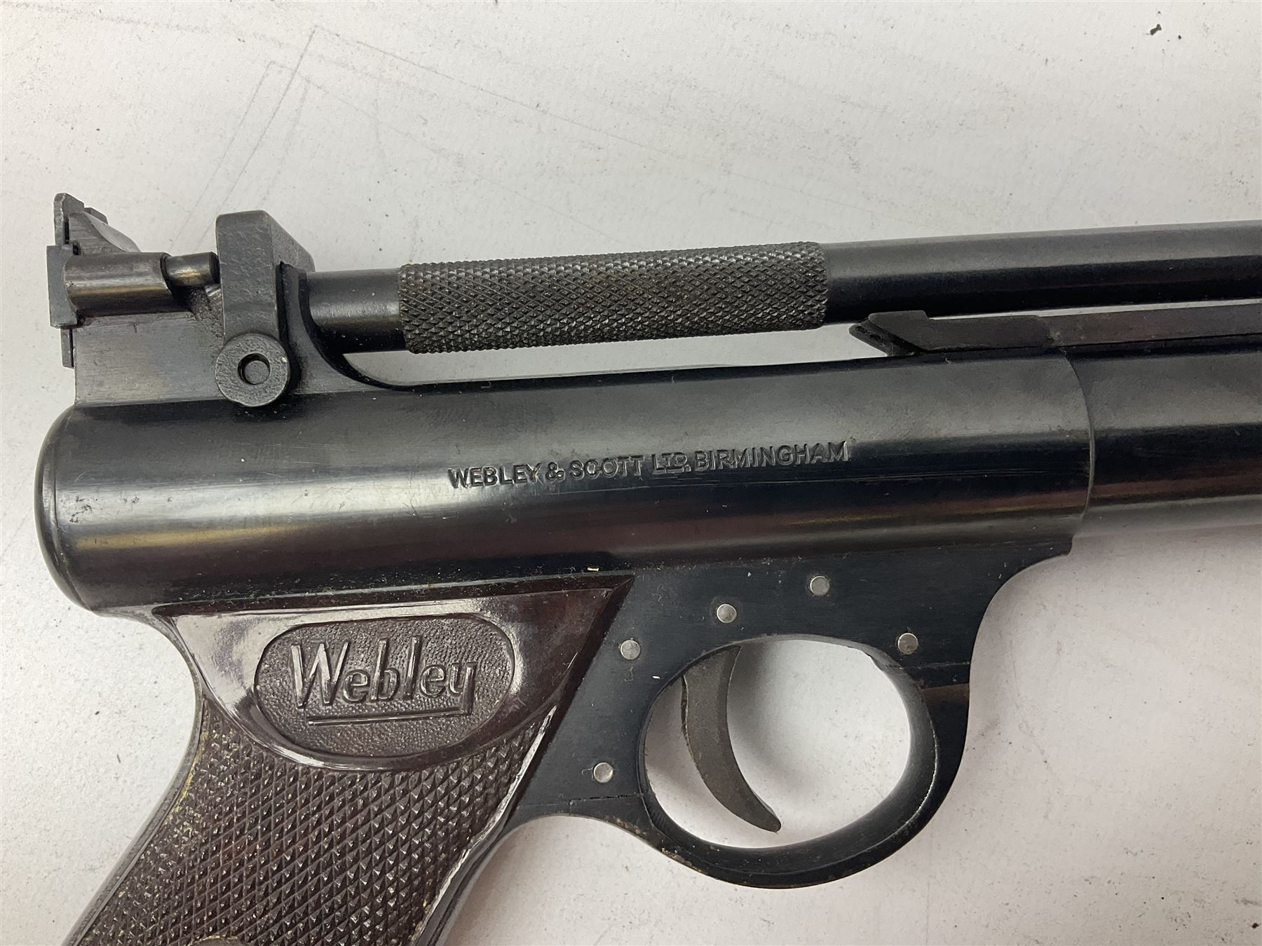 Webley Premier .22 air pistol with over lever action No.902 L24cm; and quantity of .22 pellets in two tins